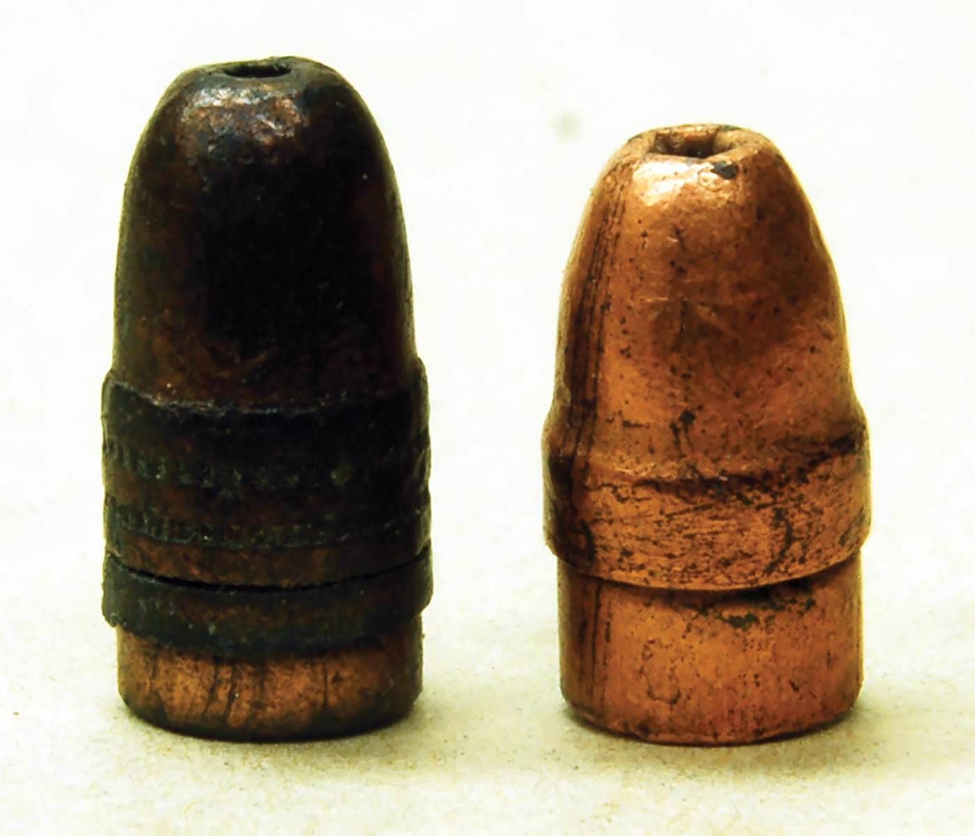 Note the deep crimp grooves in the heel of these 22LR bullets. It is the reason for much inaccuracy and hasn’t changed since the 1880s.